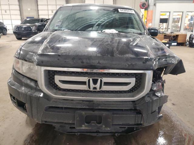 Photo 5 from auction – 2011 HONDA RIDGELINE with VIN 5FPYK1F52BB006142