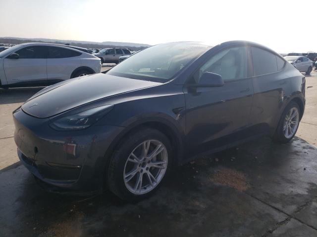TESLA MODEL Y 2023 with VIN 7SAYGAEE1PF661107 - Photo from auction
