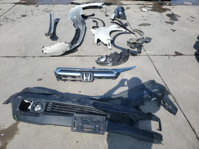 Photo 13 from auction – 2019 HONDA RIDGELINE with VIN 5FPYK3F6XKB022111