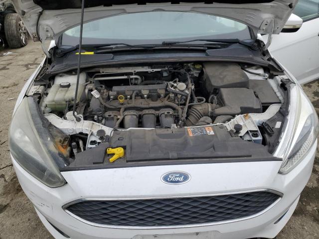 Photo 11 from auction – 2016 FORD FOCUS SE with VIN 1FADP3F29GL396001