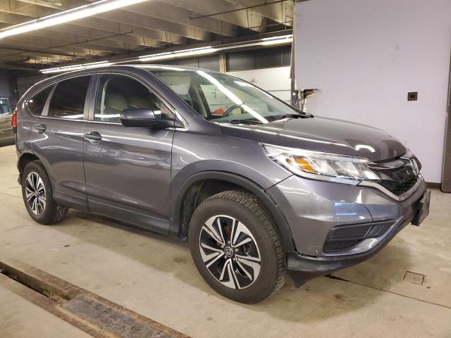 Photo 4 from auction – 2015 HONDA CR-V LX with VIN 5J6RM4H36FL066488