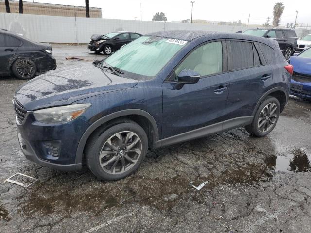 MAZDA CX-5 GT 2016 with VIN JM3KE4DY9G0783581 - Photo from auction