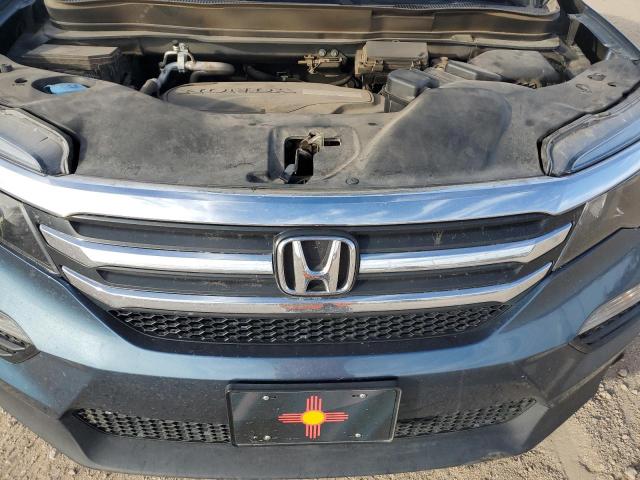 Фото 12 с аукциона – 2018 HONDA PILOT EXLN с VIN 5FNYF6H75JB045802