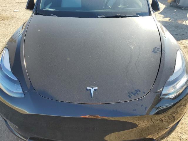 Photo 11 from auction – 2023 TESLA MODEL Y with VIN 7SAYGDEE5PF882954