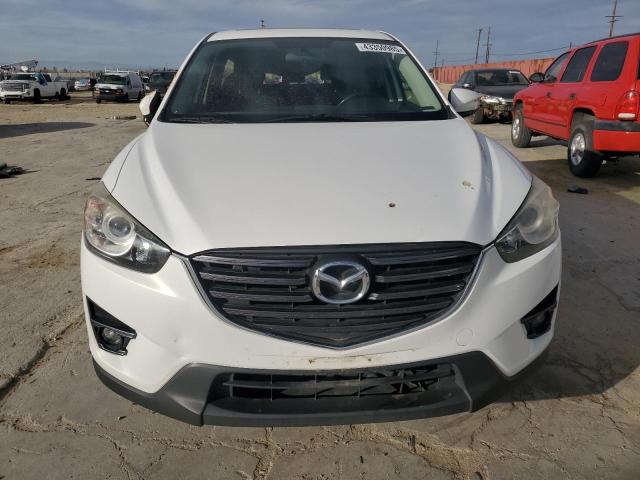 Photo 5 from auction – 2016 MAZDA CX-5 TOURI with VIN JM3KE4CY4G0827391