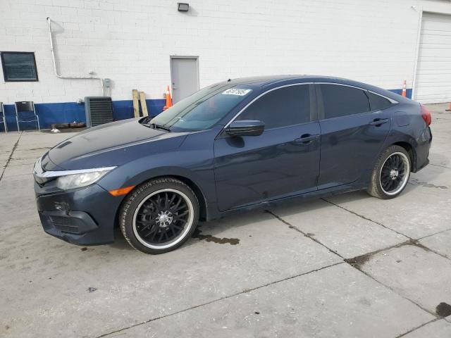 HONDA CIVIC LX 2017 with VIN 2HGFC2F55HH561366 - Photo from auction