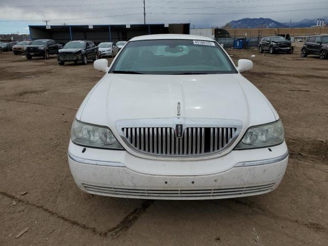 Photo 5 from auction – 2004 LINCOLN TOWN CAR E with VIN 1LNHM81W24Y613734