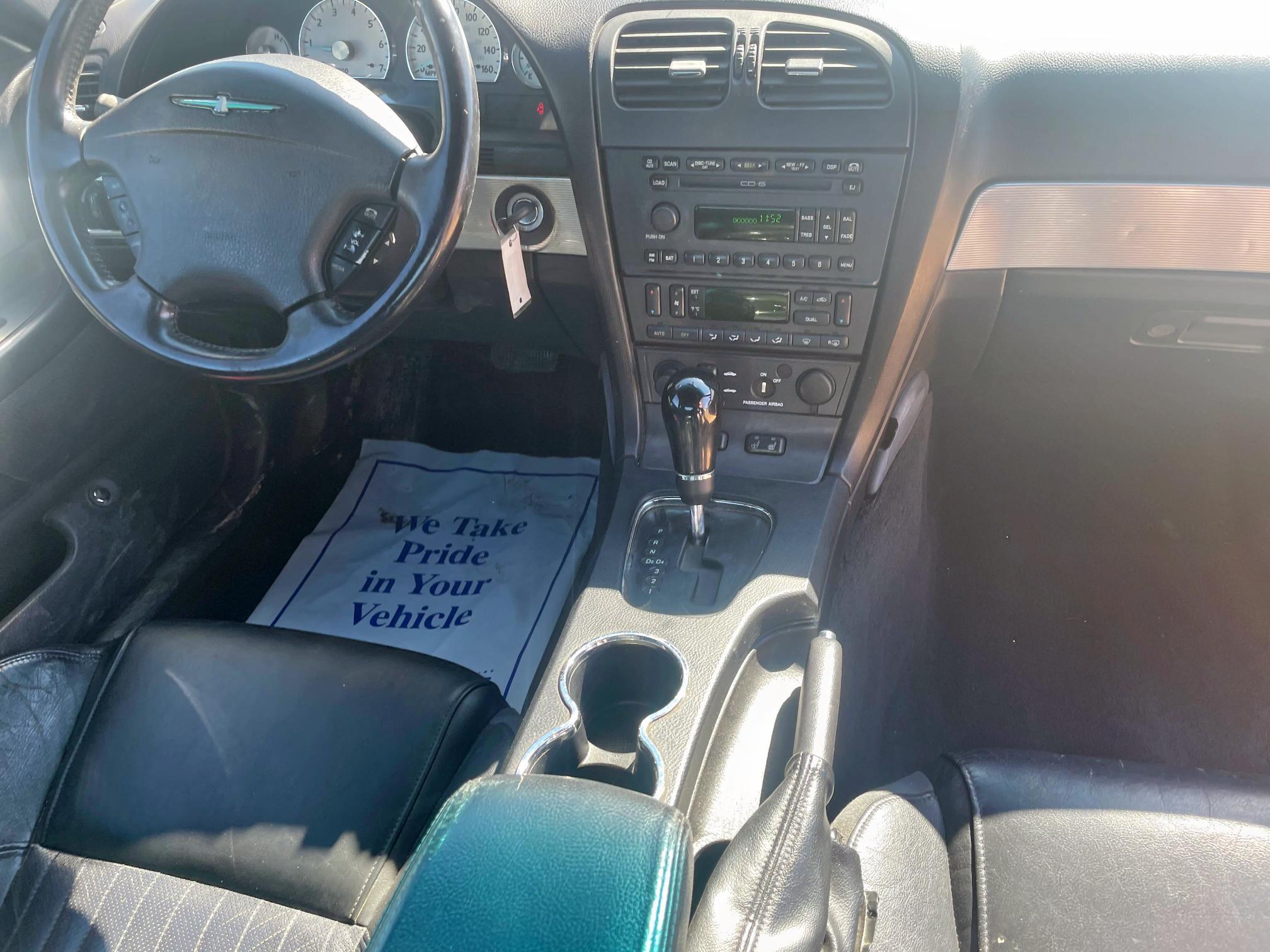 Photo 9 from auction – 2004 FORD THUNDERBIR with VIN 1FAHP60AX4Y106818