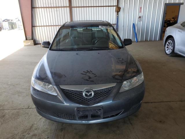 Photo 5 from auction – 2003 MAZDA 6 I with VIN 1YVFP80C935M07542