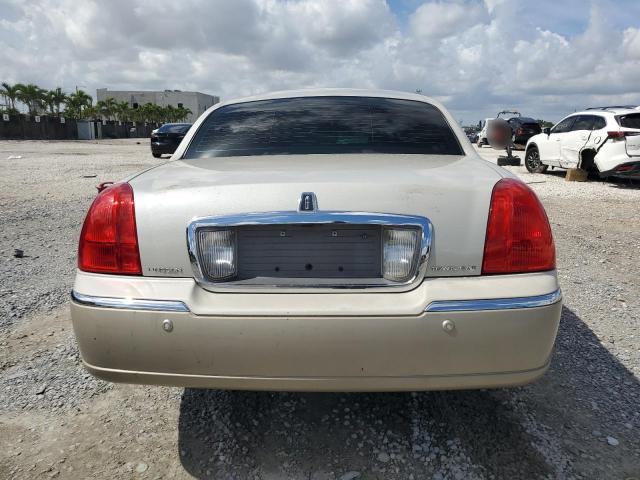 Photo 6 from auction – 2004 LINCOLN TOWN CAR E with VIN 1LNHM81W44Y685180