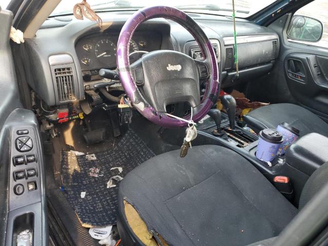 Photo 8 from auction – 2003 JEEP GRAND CHER with VIN 1J4GW48S03C553657