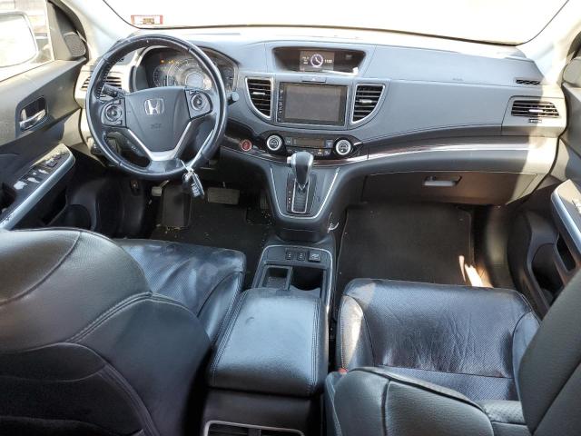 Photo 8 from auction – 2015 HONDA CR-V with VIN 2HKRM4H71FH671757