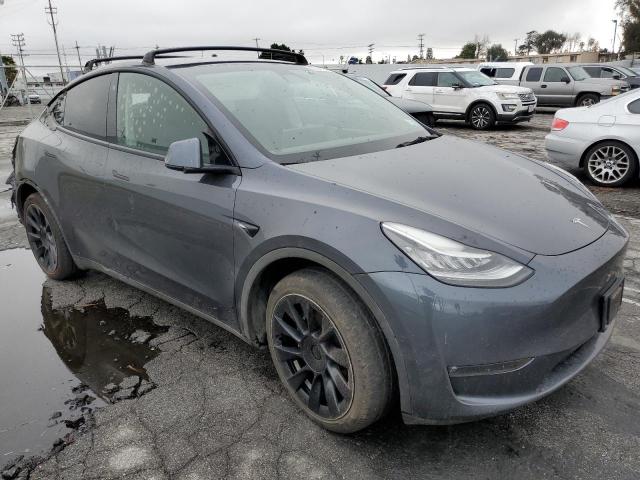 Photo 4 from auction – 2021 TESLA MODEL Y with VIN 5YJYGAEE9MF180613