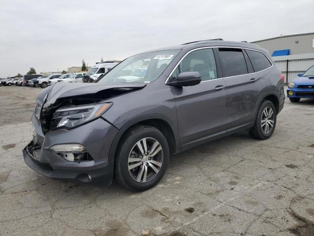 HONDA PILOT EX 2017 with VIN 5FNYF5H37HB023382 - Photo from auction