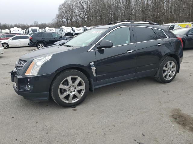 CADILLAC SRX PERFOR 2011 with VIN 3GYFNBEY4BS670906 - Photo from auction