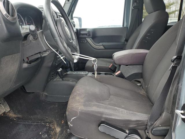 Photo 7 from auction – 2014 JEEP WRANGLER U with VIN 1C4BJWDG4EL318287