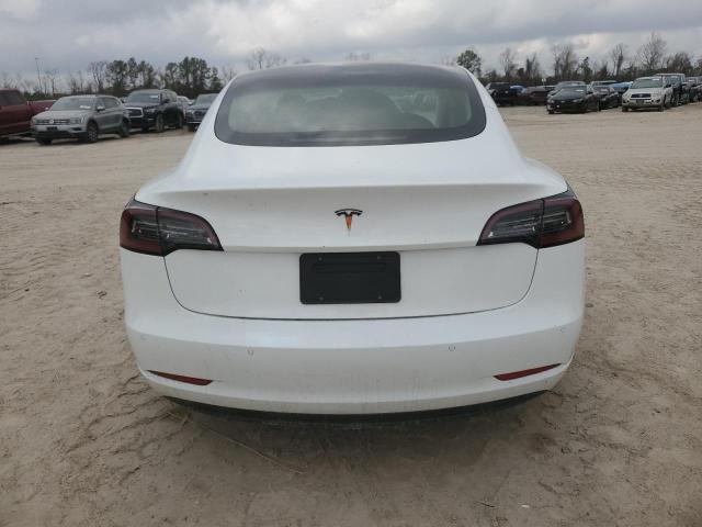 Снимка 6 от търг – 2021 TESLA MODEL 3 с VIN 5YJ3E1EA2MF030744