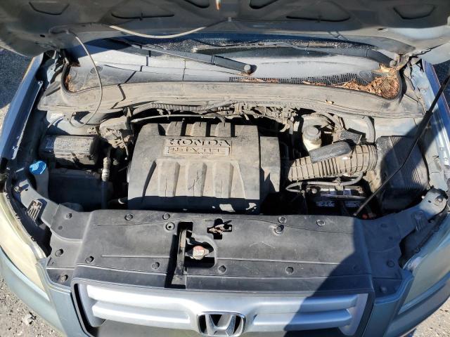 Photo 11 from auction – 2006 HONDA PILOT EX with VIN 5FNYF28556B052361