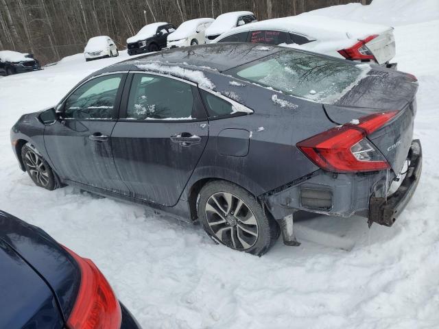 Photo 2 from auction – 2017 HONDA CIVIC EX with VIN 2HGFC2F85HH037581
