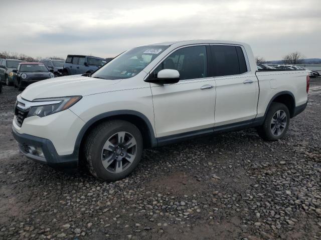 HONDA RIDGELINE 2017 with VIN 5FPYK3F72HB031824 - Photo from auction