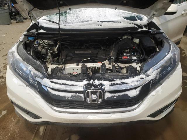 Photo 12 from auction – 2015 HONDA CR-V SE with VIN 2HKRM4H40FH101173