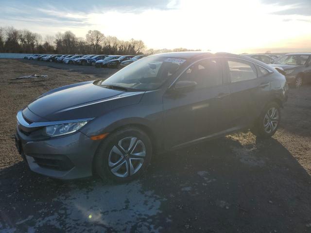 HONDA CIVIC LX 2018 with VIN 2HGFC2F58JH584582 - Photo from auction