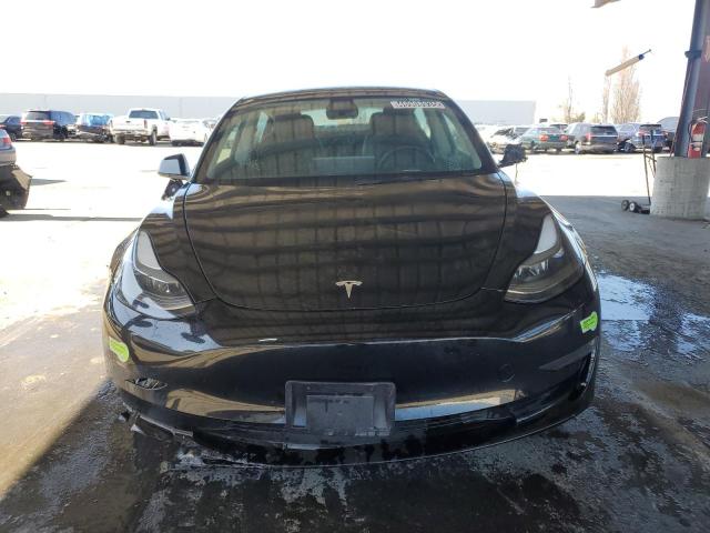 Photo 5 from auction – 2023 TESLA MODEL 3 with VIN 5YJ3E1EA4PF454043