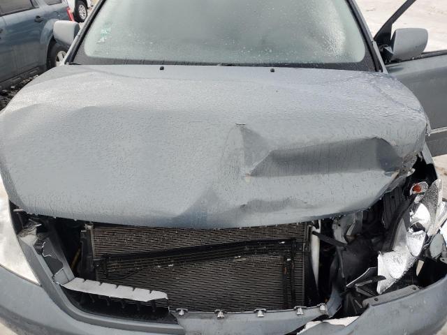 Photo 12 from auction – 2008 HYUNDAI ENTOURAGE with VIN KNDMC233386046652