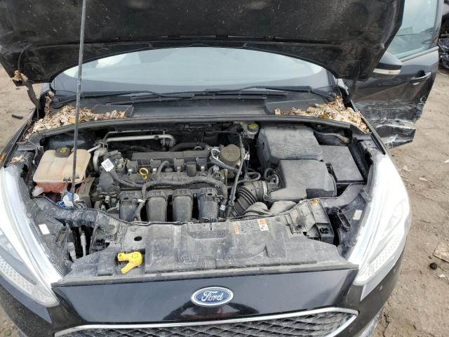 Photo 11 from auction – 2016 FORD FOCUS SE with VIN 1FADP3F25GL244278