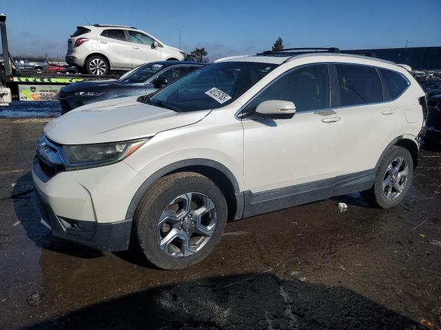 HONDA CR-V EXL 2017 with VIN 5J6RW2H81HL007202 - Photo from auction