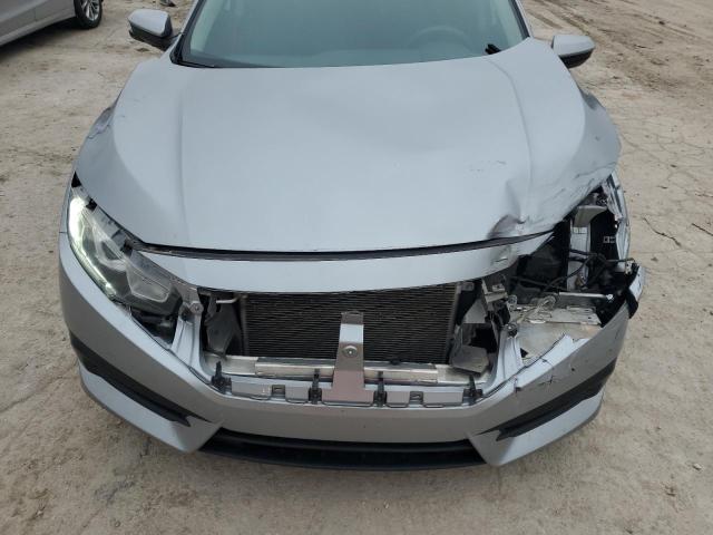 Photo 11 from auction – 2018 HONDA CIVIC EX with VIN 19XFC2F71JE041828