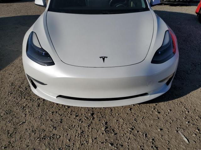 Photo 11 from auction – 2021 TESLA MODEL 3 with VIN 5YJ3E1EA1MF928445