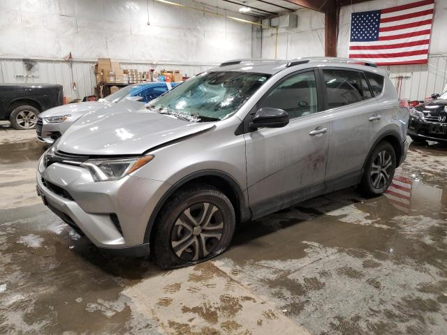 TOYOTA RAV4 LE 2018 with VIN 2T3ZFREV4JW462069 - Photo from auction