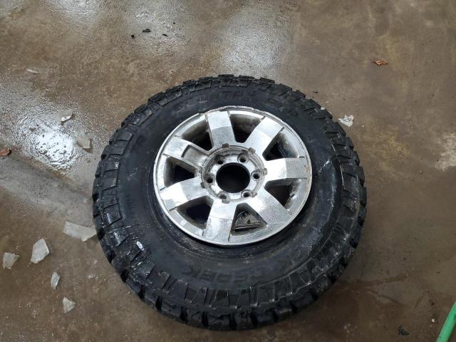 Photo 13 from auction – 2009 HUMMER H3 with VIN 5GTEN13E898117093