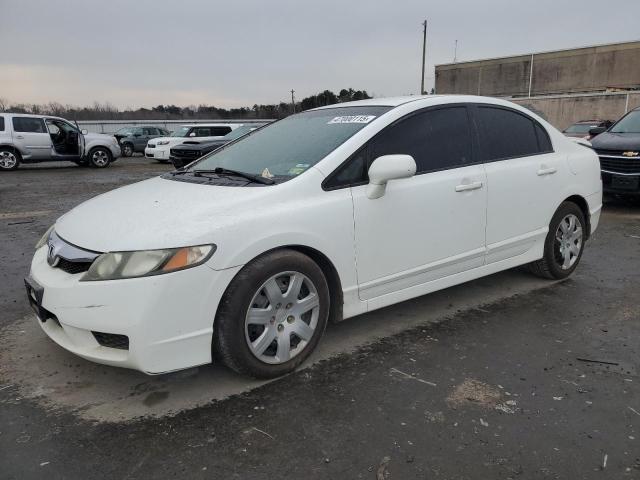 HONDA CIVIC LX 2011 with VIN 2HGFA1F59BH310020 - Photo from auction
