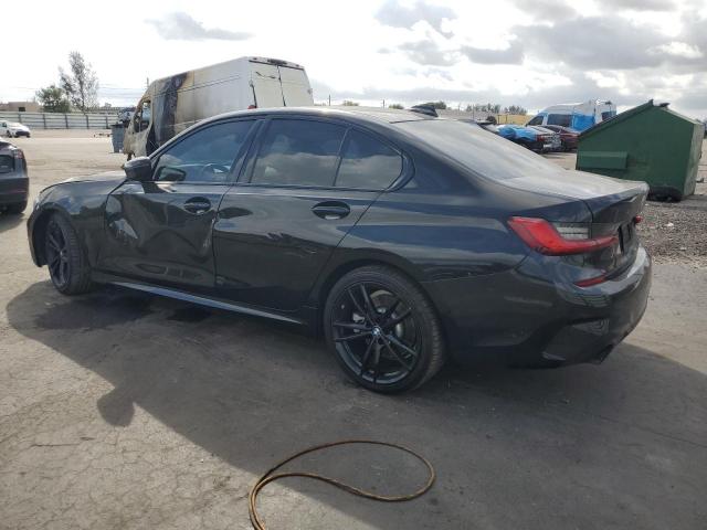 Photo 2 from auction – 2021 BMW 330I with VIN 3MW5R1J07M8B95975