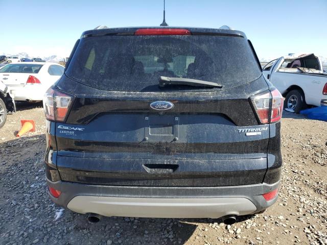 Photo 6 from auction – 2018 FORD ESCAPE TIT with VIN 1FMCU9J92JUC74874