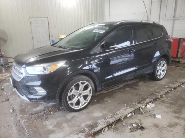 FORD ESCAPE TIT 2018 with VIN 1FMCU0J92JUC85885 - Photo from auction