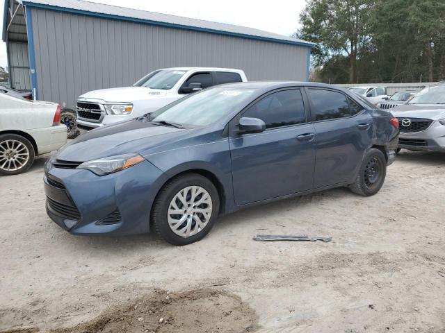 TOYOTA COROLLA L 2019 with VIN 5YFBURHE5KP903268 - Photo from auction