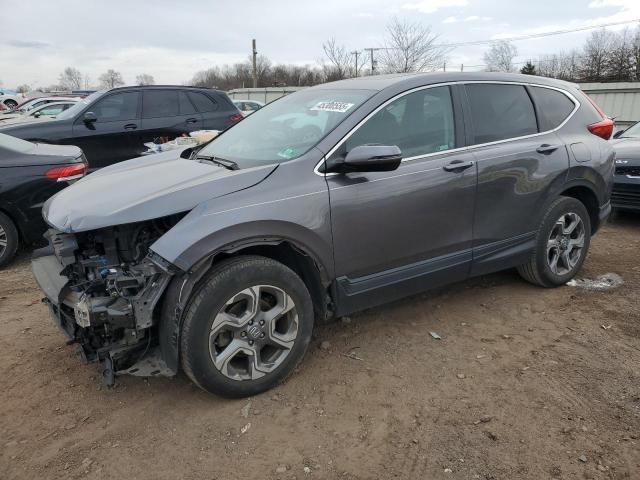 HONDA CR-V EX 2018 with VIN 5J6RW2H55JA001801 - Photo from auction