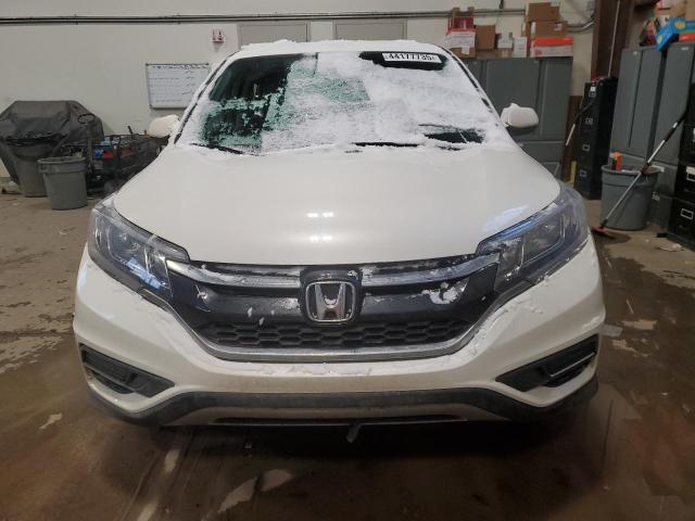 Photo 5 from auction – 2015 HONDA CR-V SE with VIN 2HKRM4H40FH101173