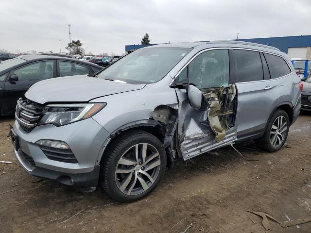 HONDA PILOT ELIT 2017 with VIN 5FNYF6H03HB010060 - Photo from auction