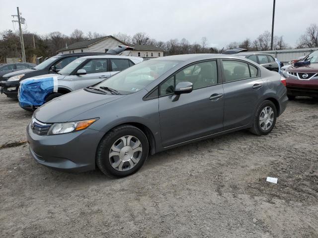HONDA CIVIC HYBR 2012 with VIN JHMFB4F37CS010142 - Photo from auction