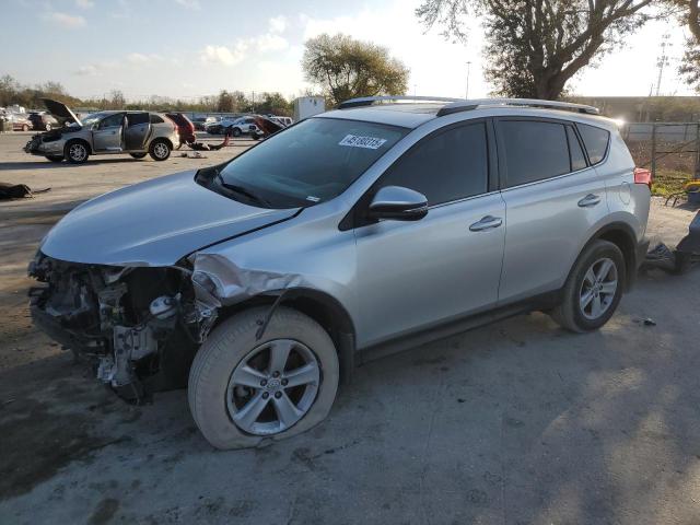 TOYOTA RAV4 XLE 2014 with VIN 2T3WFREV9EW111912 - Photo from auction