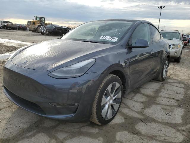TESLA MODEL Y 2023 con VIN 7SAYGAEE6PF965842 - Foto de la subasta