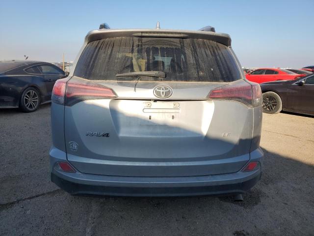 Photo 6 from auction – 2018 TOYOTA RAV4 LE with VIN 2T3ZFREV0JW439677