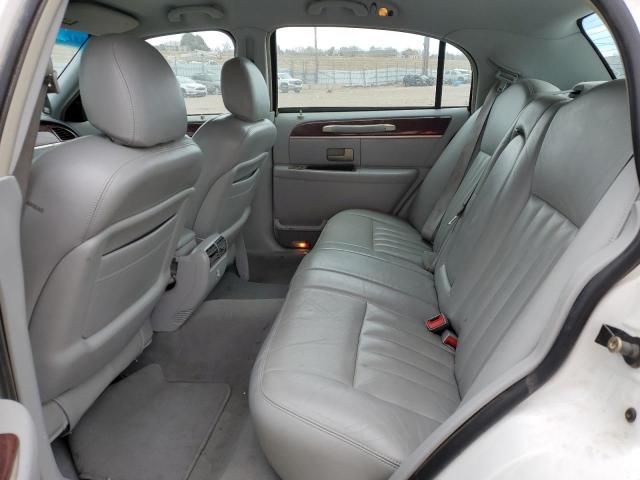 Photo 10 from auction – 2004 LINCOLN TOWN CAR E with VIN 1LNHM81W24Y613734
