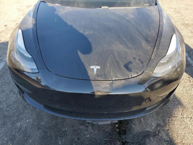 Photo 11 from auction – 2021 TESLA MODEL 3 with VIN 5YJ3E1EA5MF074558