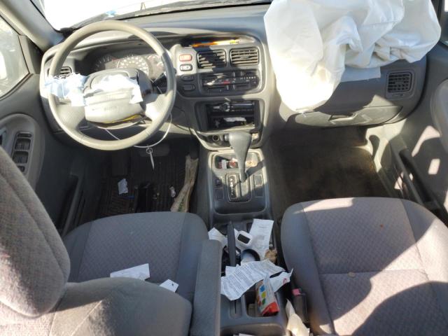 Снимка 8 от търг – 2004 CHEVROLET TRACKER с VIN 2CNBE134846906856