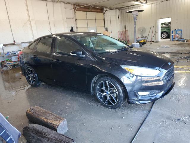 Photo 4 from auction – 2015 FORD FOCUS SE with VIN 1FADP3F24FL367486
